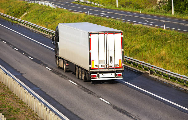 istock truck moves on highway 606008852