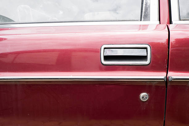 istock Close up Door handle of old car 606009026