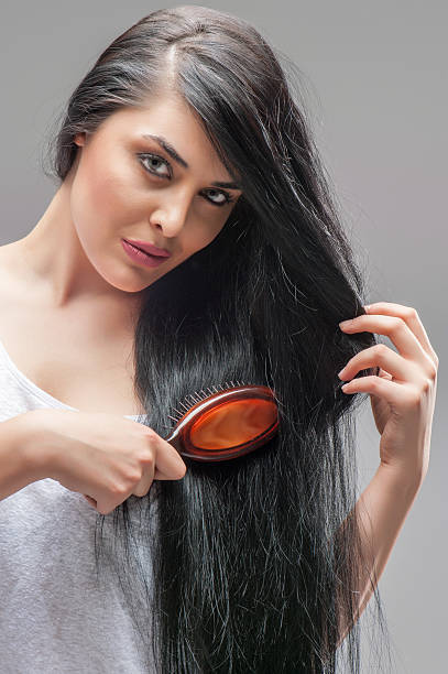 istock Brunette girl with long hair 606010350