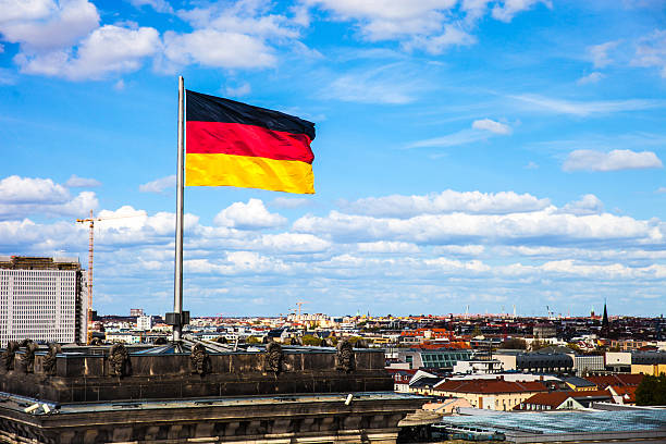 istock German Flag against Berlin skyline 606010578
