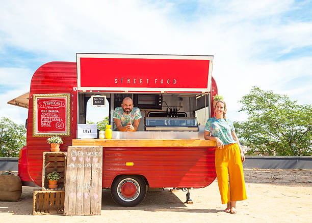 istock Food truck and owners 606011494