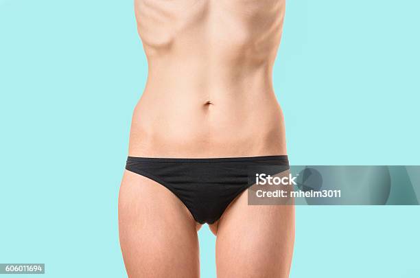 Very Thin Woman Suffering From Extreme Dieting Stock Photo - Download Image Now - Women, Anorexia Nervosa, Underweight