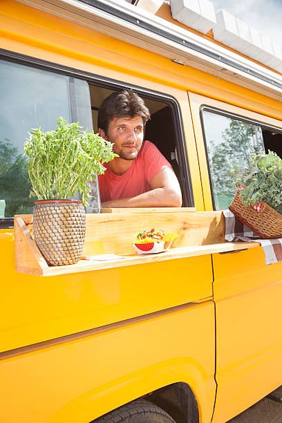 istock Food truck and owners 606011716