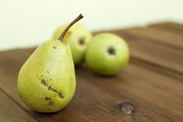 istock Some yellow pears are on the wooden table 606012466