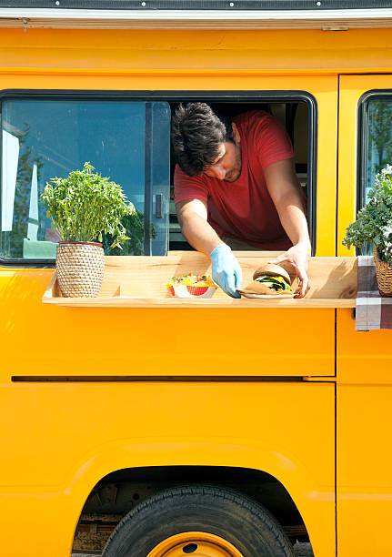 istock Food truck chef 606012856