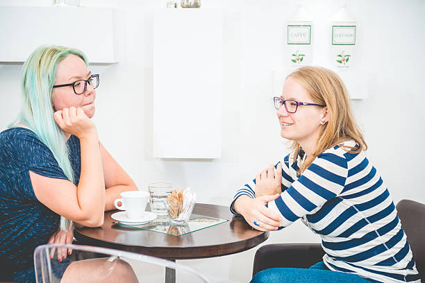 istock Two Pretty Women at the Coffee Bar Cafe Trieste, Europe 606014366