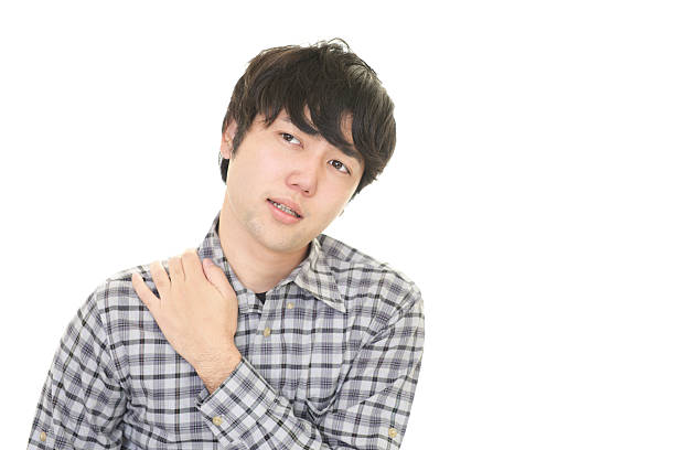 istock Asian man having a shoulder pain 606015252