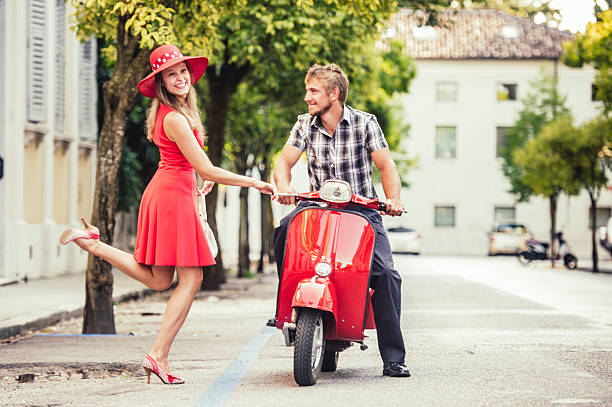 istock Hitchhiking for a Scooter Ride 606015582