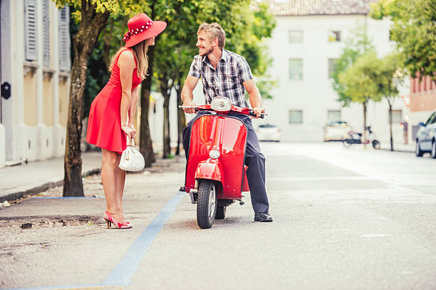 istock Hitchhiking for a Scooter Ride 606015602