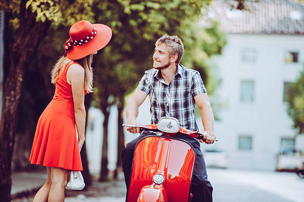 istock Hitchhiking for a Scooter Ride 606015608