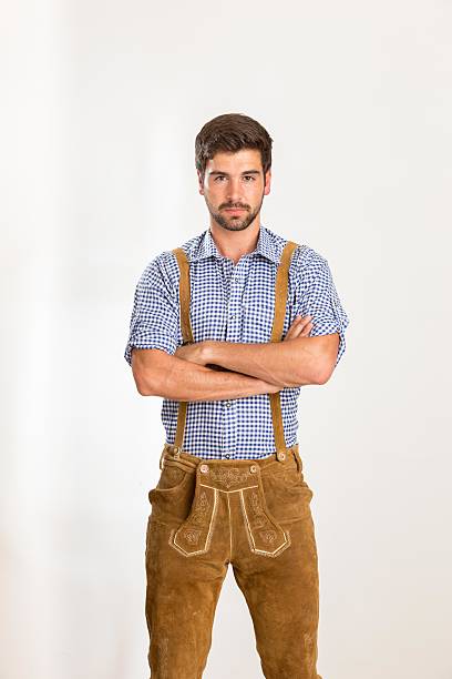 istock Young man in leather pants crossed his arms 606017454