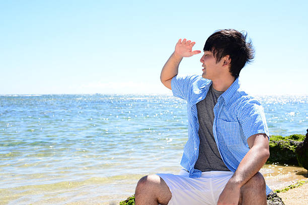 Portrait of young man on a tropical beach