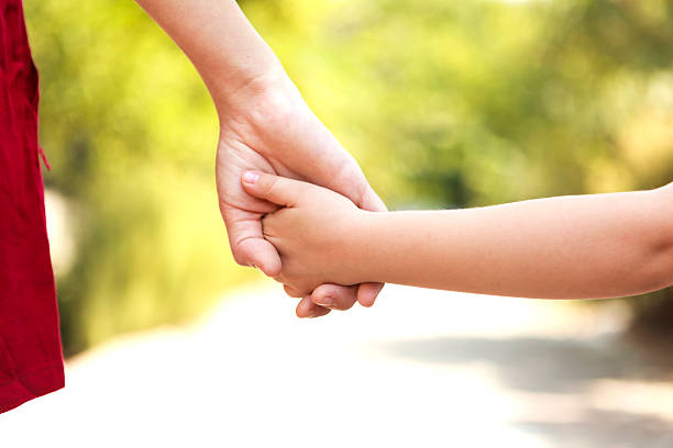 istock Mother And Daughter Walking 606018714