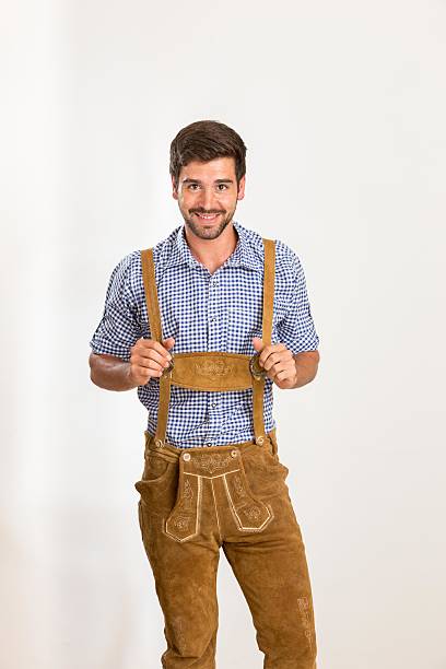 istock Young man in leather pants is happy 606019038