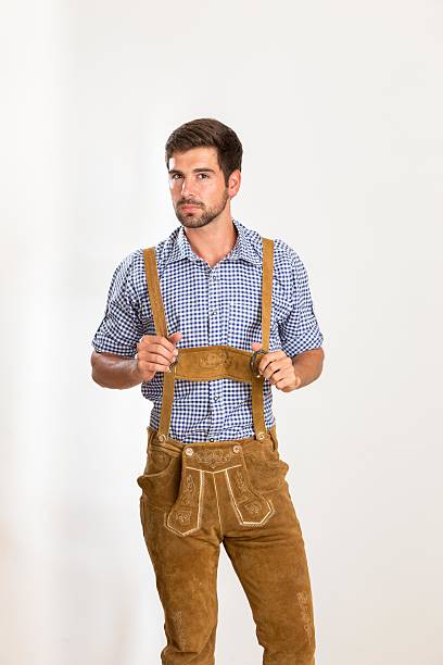 istock Young man in leather pants is posing 606019124