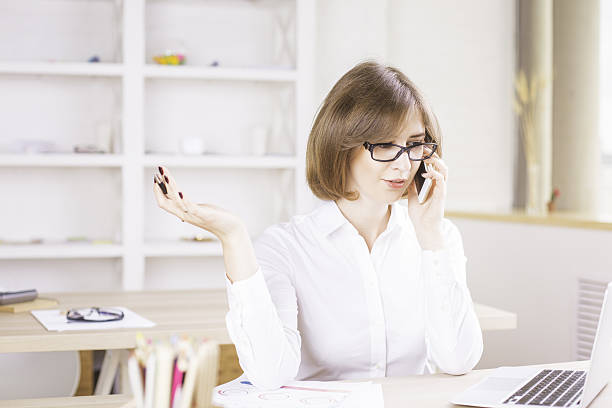 istock Woman talking on phone 606020826