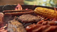 istock SLO MO TU Barbecuing meat and corn 606087522