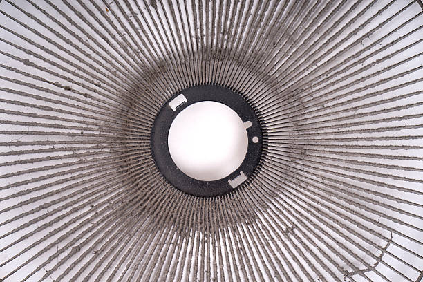 istock dirty electric fan on white background 606195832