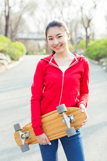 istock girl and her skateboard 606196190