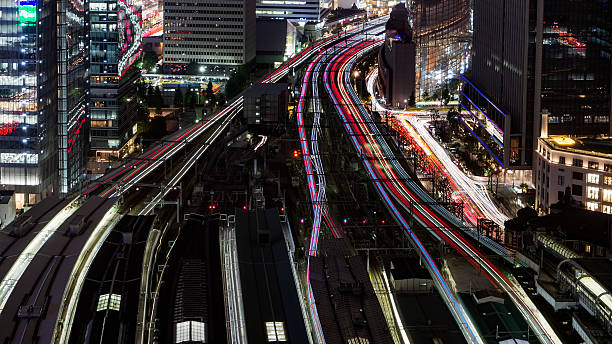 istock Light trace of trains at Tokyo station 606200796