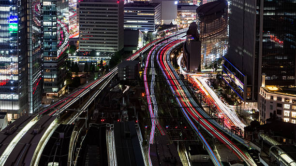 istock Light trace of trains at Tokyo station 606200810