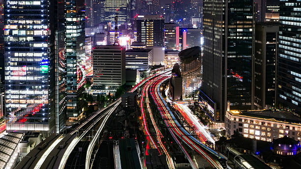 istock Light trace of trains at Tokyo station 606200840