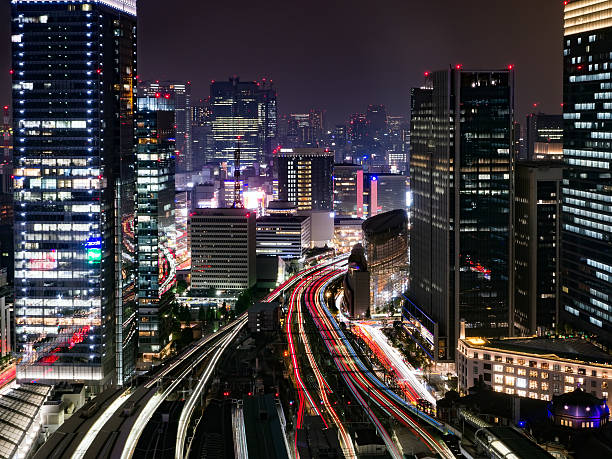 istock Light trace of trains at Tokyo station 606200858