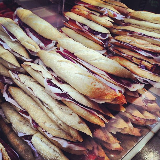 istock Sandwiches with Spanish ham for sale in Madrid, Spain 606201820