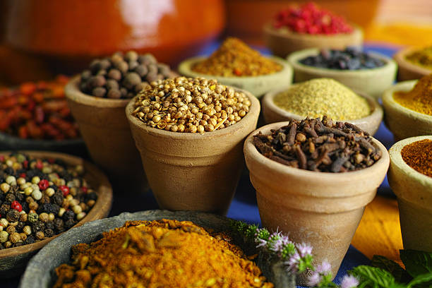 istock Collection of different spices in old clay bowls 606203396