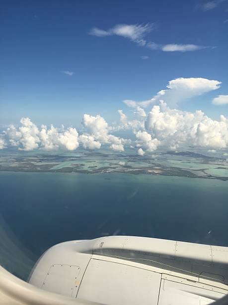 istock airplane view of tropical ocean 606203690