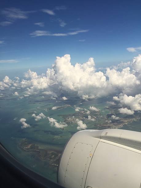 istock airplane view of tropical ocean 606203698
