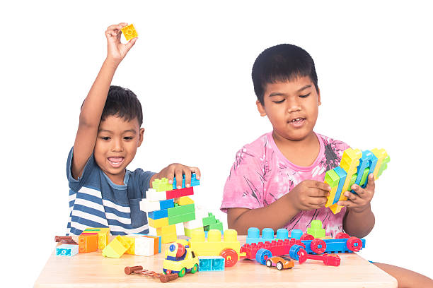 istock Two little boy play building brick 606204028