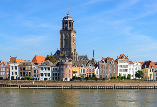 The city of Deventer located at the banks of the river IJssel in Overijssel, The Netherlands. The tower of the St. Lebuinus Church or great Church is a landmark in the city center.