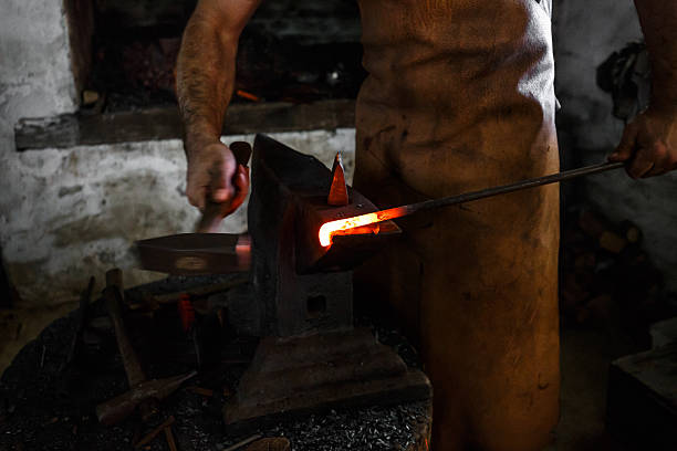 istock The blacksmith forge the hot metal 606208046