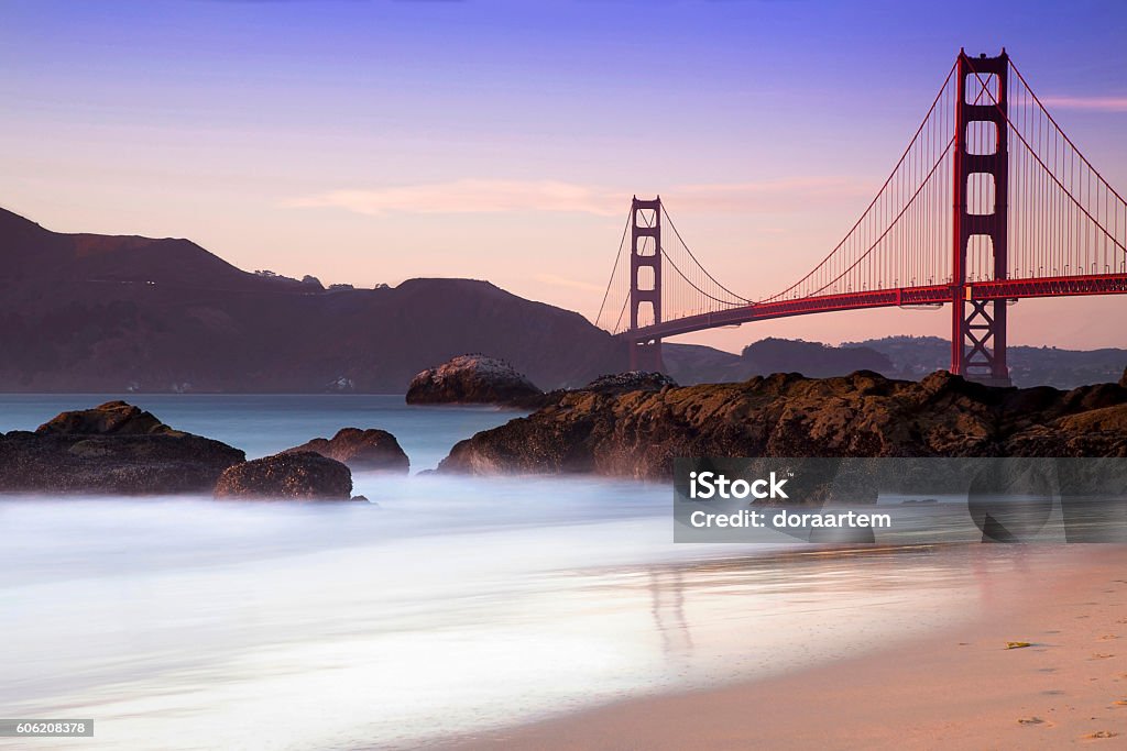 The Bridge Golden Gate from Baker beach in the sunset Golden Gate Bridge Stock Photo