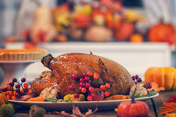 istock Roasted Thanksgiving Turkey with Side Dishes 606211430
