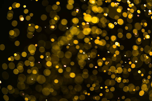 istock abstract background with bokeh defocused lights and shadow 606212550