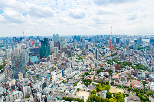 Tokyo,Japan - May 25, 2015: View from above on Tokyo Tower with skyline in Japan from roppongi towers on cloudy day
