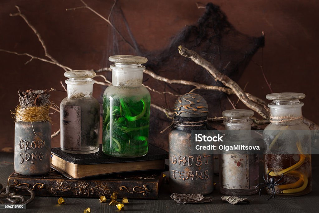 witch apothecary jars magic potions halloween decoration witch apothecary jars magic potions book halloween decoration Potion Stock Photo
