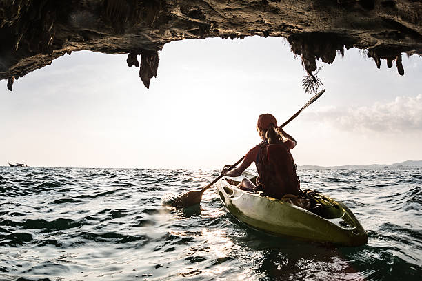 istock Young lady paddling the kayak 606217702