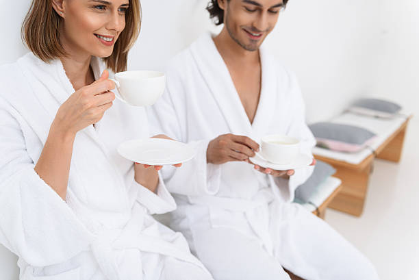 istock Mature couple relaxing together at day spa 606218528