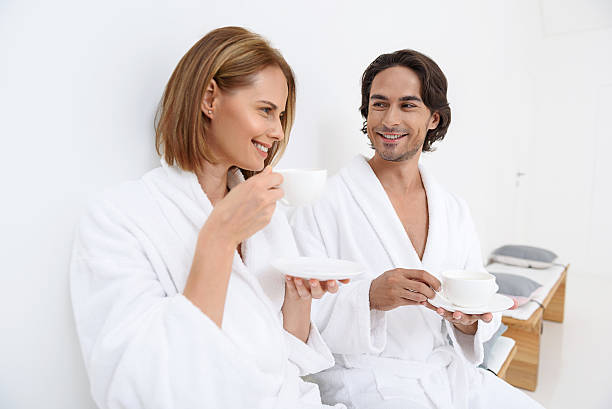 istock Mature couple relaxing together at day spa 606218608