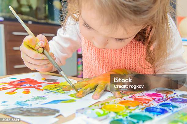 Drawing By Paints Stock Photo - Download Image Now - Child, Painting - Activity, Painting - Art Product