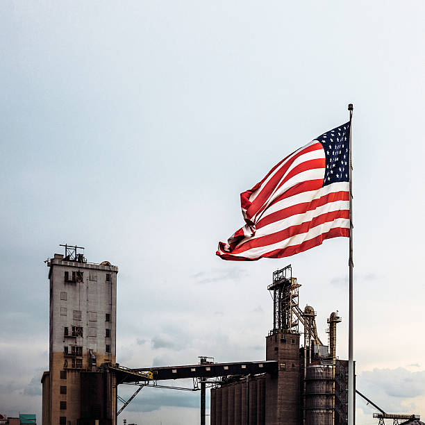 istock Industrial buildings and American flag. 606223230
