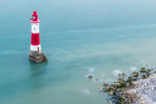 Beachy Head Lighthouse and edge of  coastline. East Sussex, Great Britain