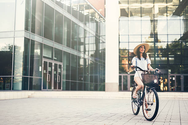 istock Beautiful woman using bike 606233136