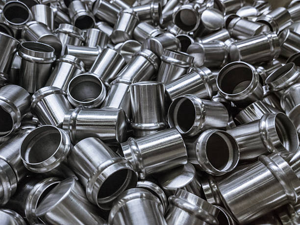istock Shiny cold deformated steel parts background 606234212