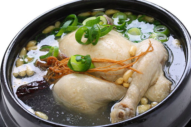 istock steaming samgyetang, chicken soup with ginseng, korean food 606236156