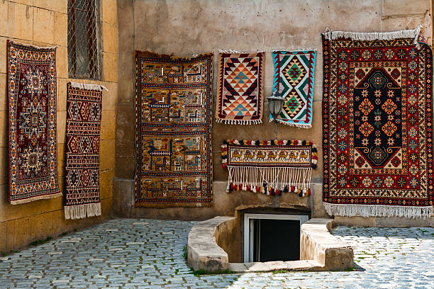 Old carpet Sale of old carpet in eastern city. Toned image baku stock pictures, royalty-free photos & images