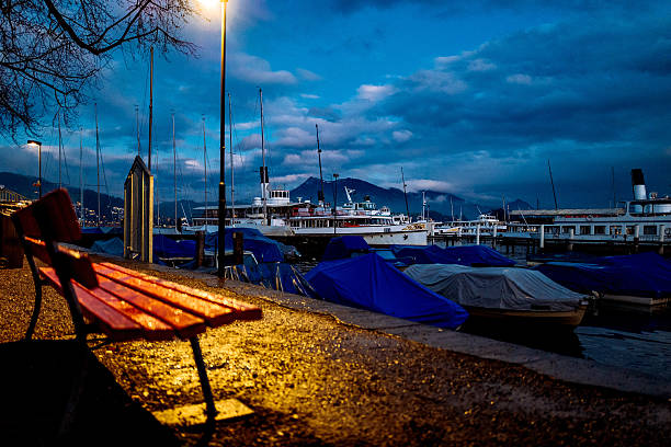 istock Covered Boats At Port Against Cloudy Sky 606373651